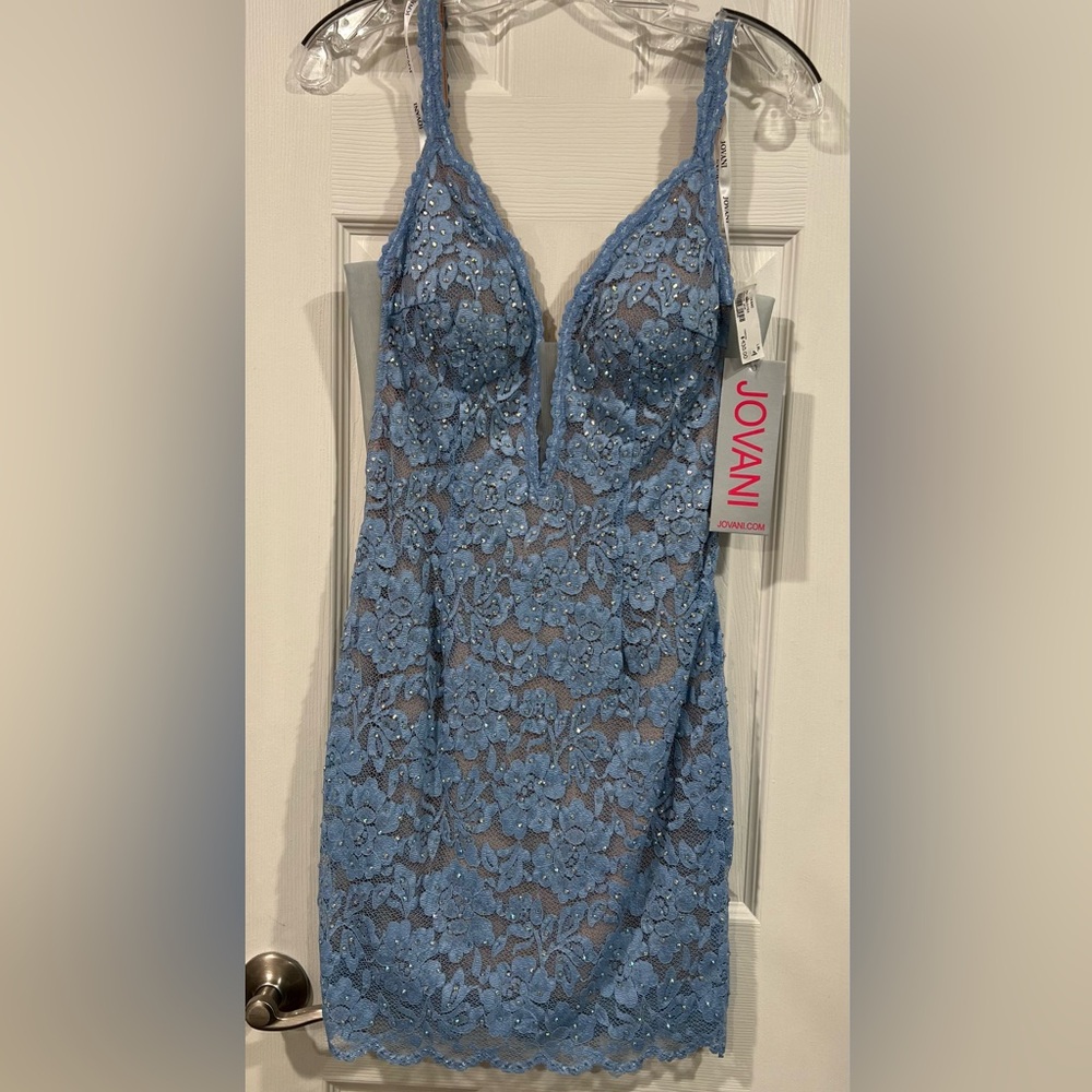 BNWT Jovani dress. Stunning, light blue lace with tasteful mesh panels.